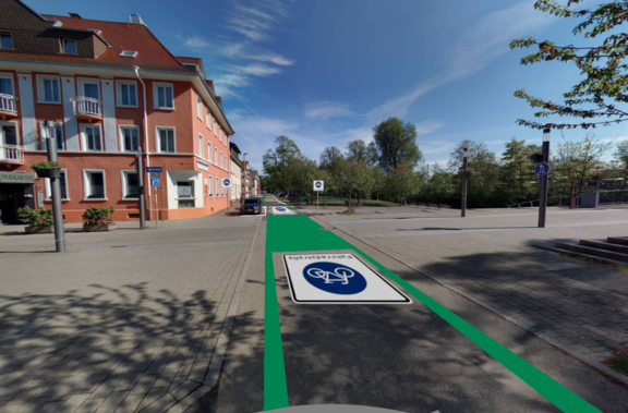 Blick in die Brigachstraße. Verkehrsgrüne Begleitstreifen, verkehrsgrüne Kreuzungen sowie weiße Parkstreifen wurden per Fotomontage eingezeichnet.